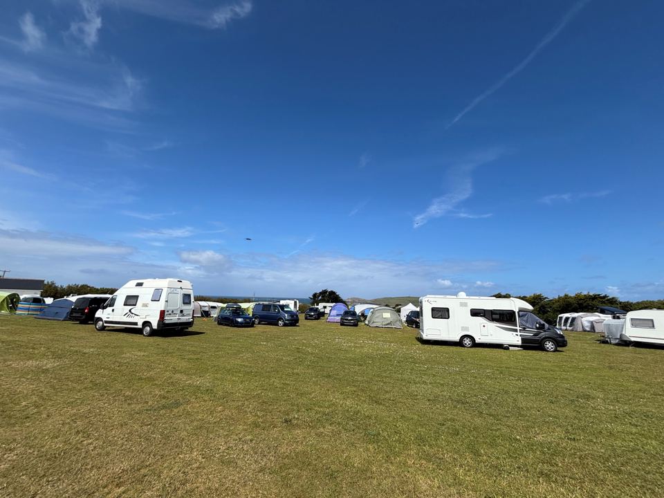 Motorhomes and caravans on grass