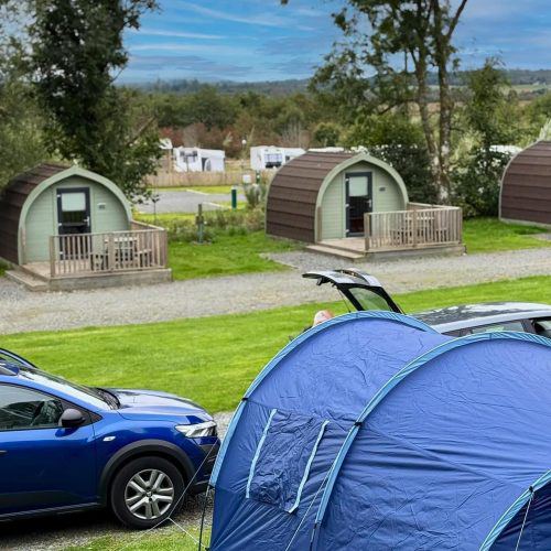 Camping pods and a tent pitch