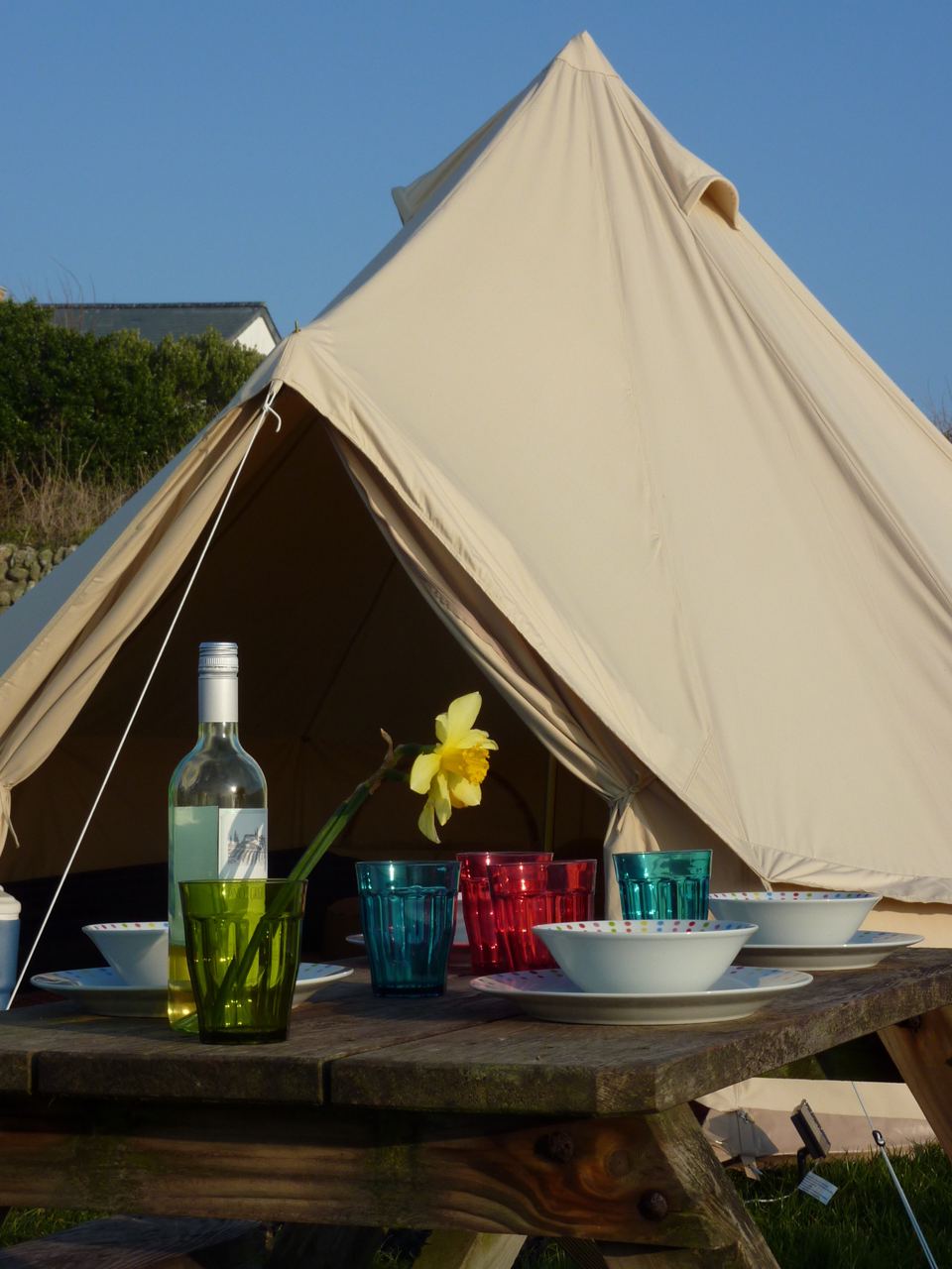 Bell tent with a table set for dinner