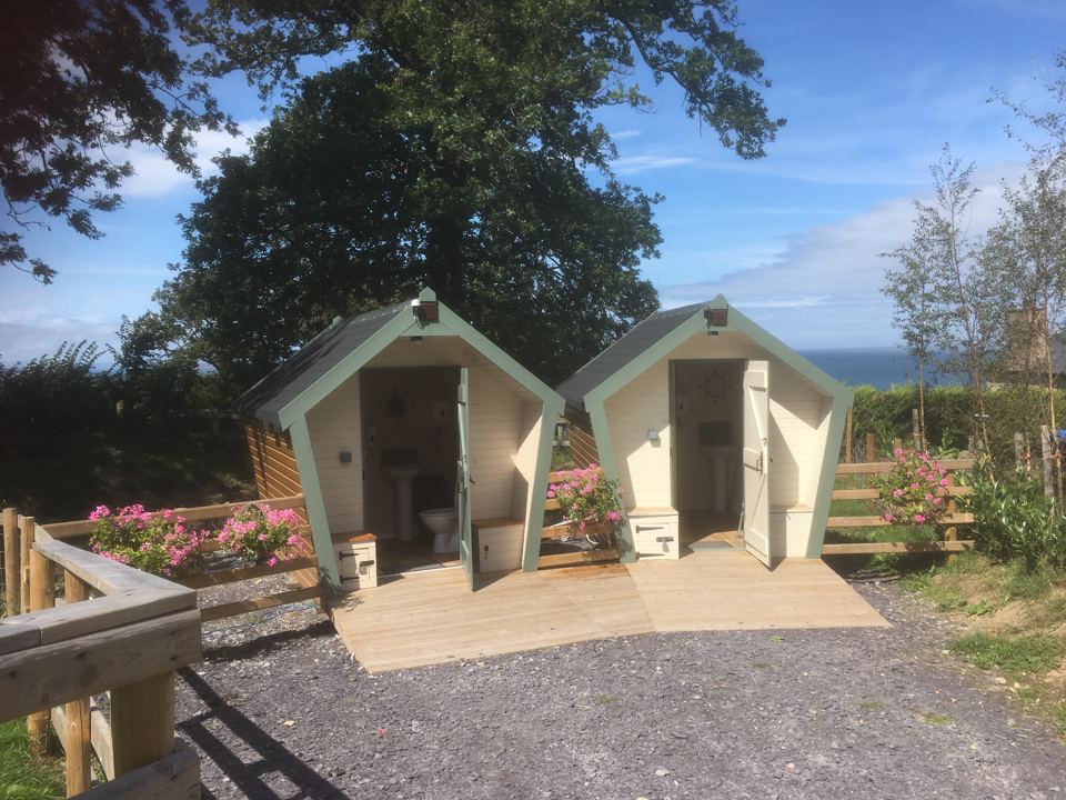 Family shower cabins by the sea