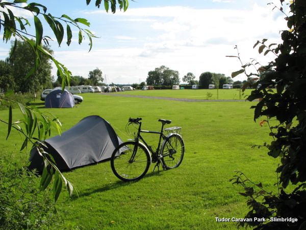 Small tent and bike on the grass