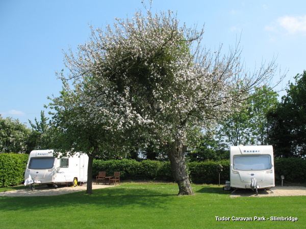 Caravans by the apple tree