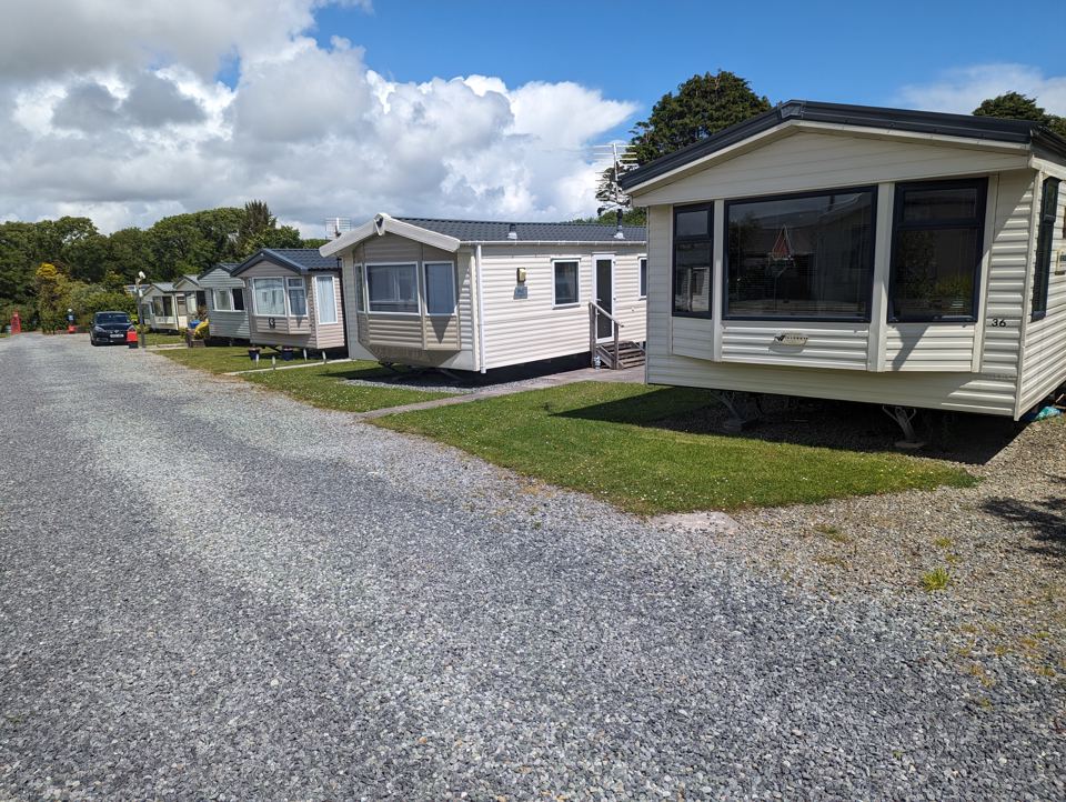 Static caravans beside the gravel road