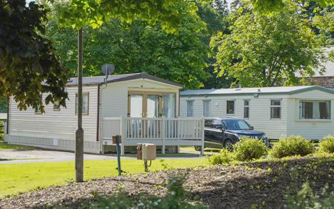 Static caravans with decking