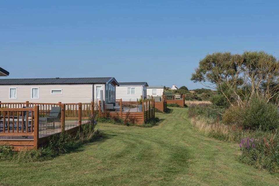 Caravans and decking on grass