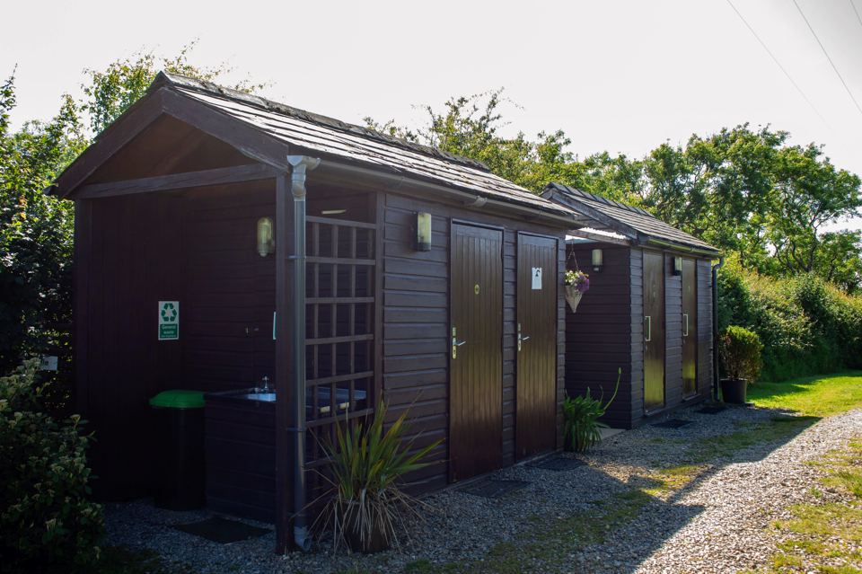 Toilet and shower block