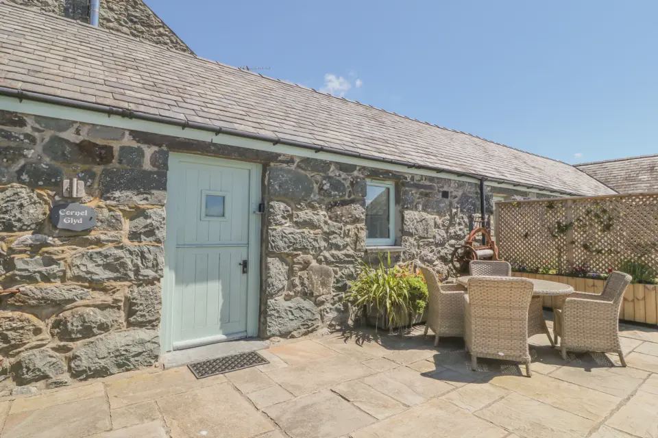 Stone cottage with patio