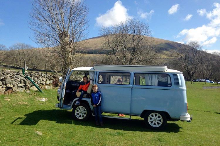 Campervan by the stone wall