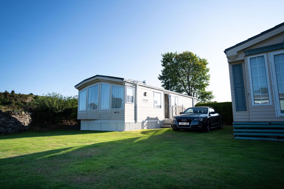 Static caravans with parked cars