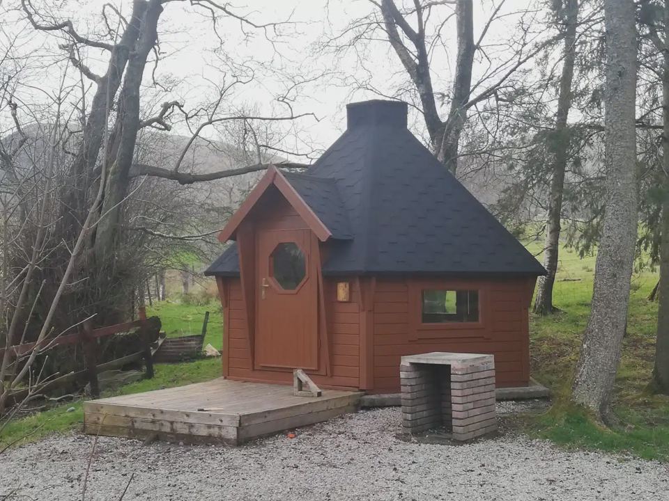 Wooden cabin among the trees