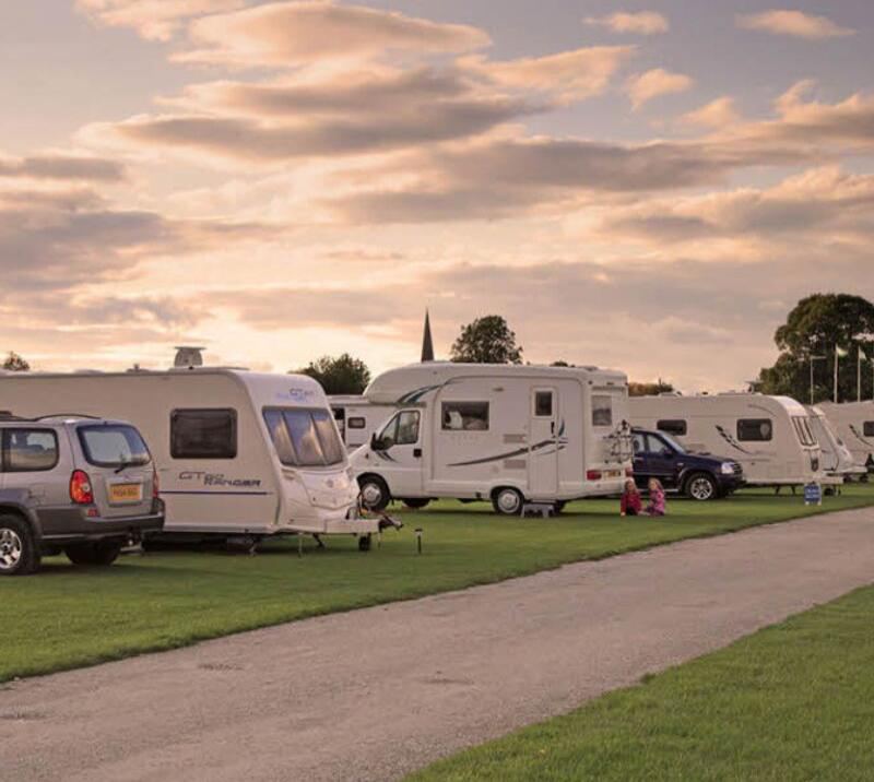 Caravans and motorhomes at dusk