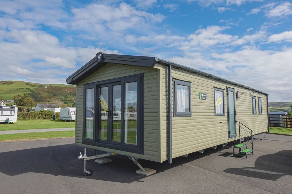 Static caravan with the field behind