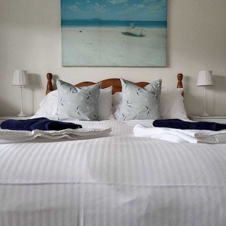 Bedroom with striped bedding