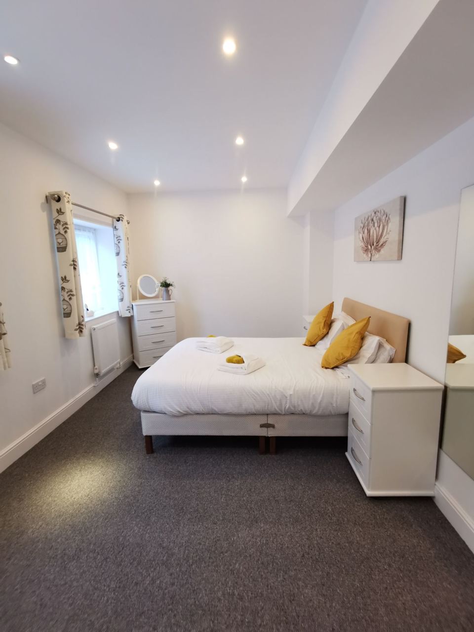 Twin bedroom with white walls