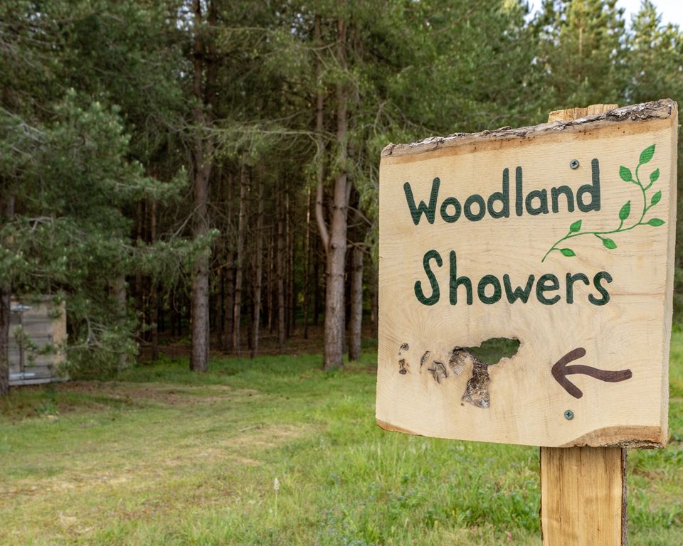 Sign to the woodland showers