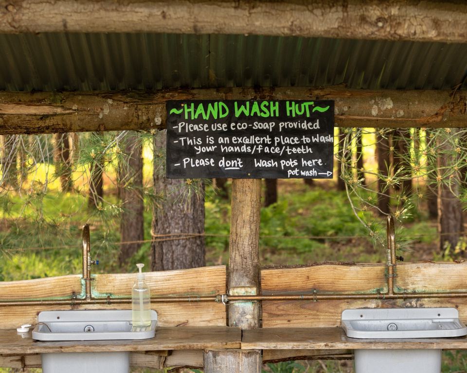 Hand wash hut in the pines