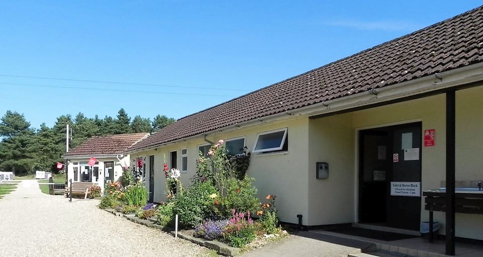 Reception and toilet block