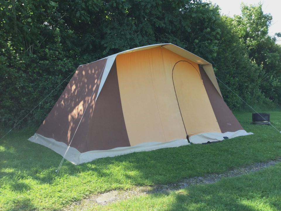 Cabin tent on the camping field