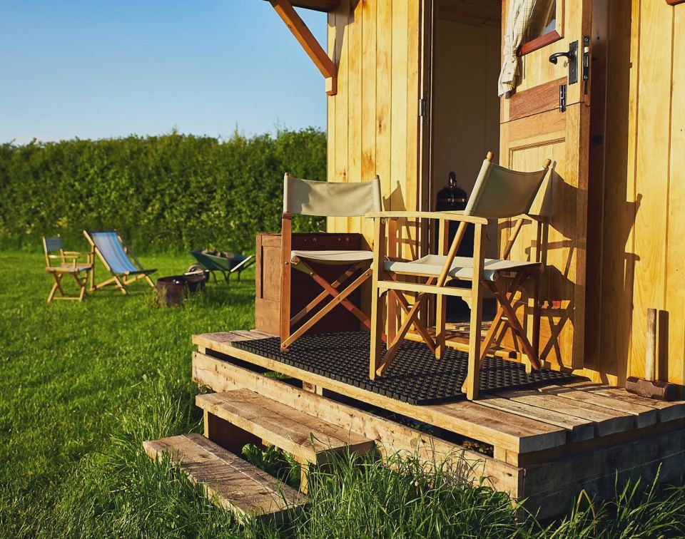 Hut deck and lawn chairs