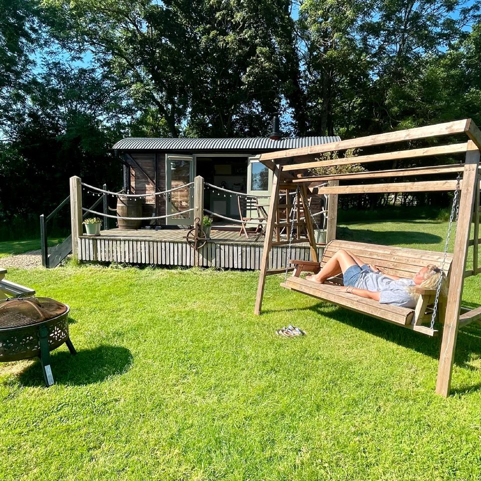 Hut deck and swing seat