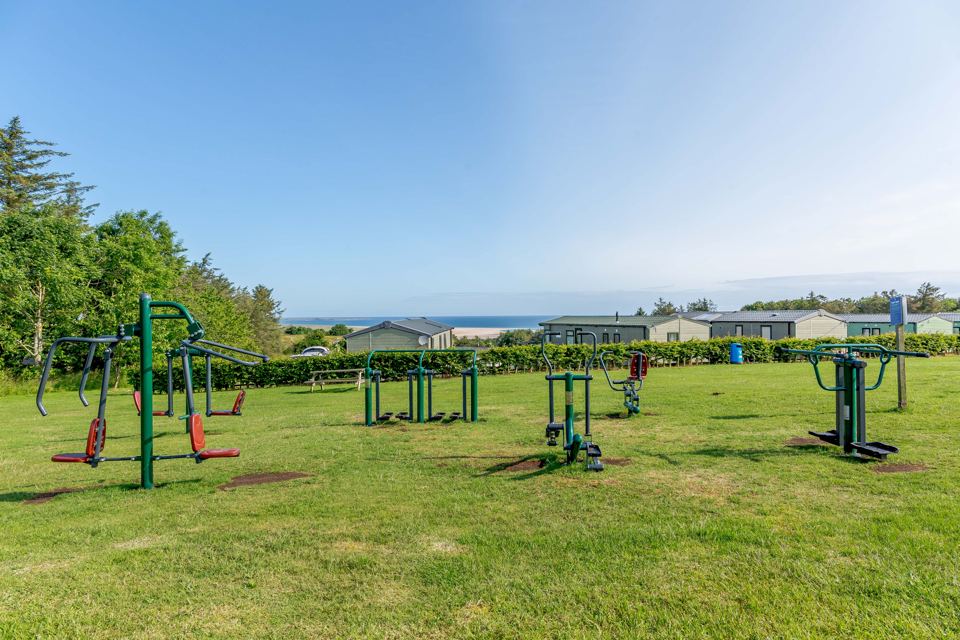 Outdoor gym with sea beyond