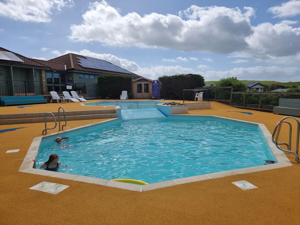 Heated outdoor splash pool