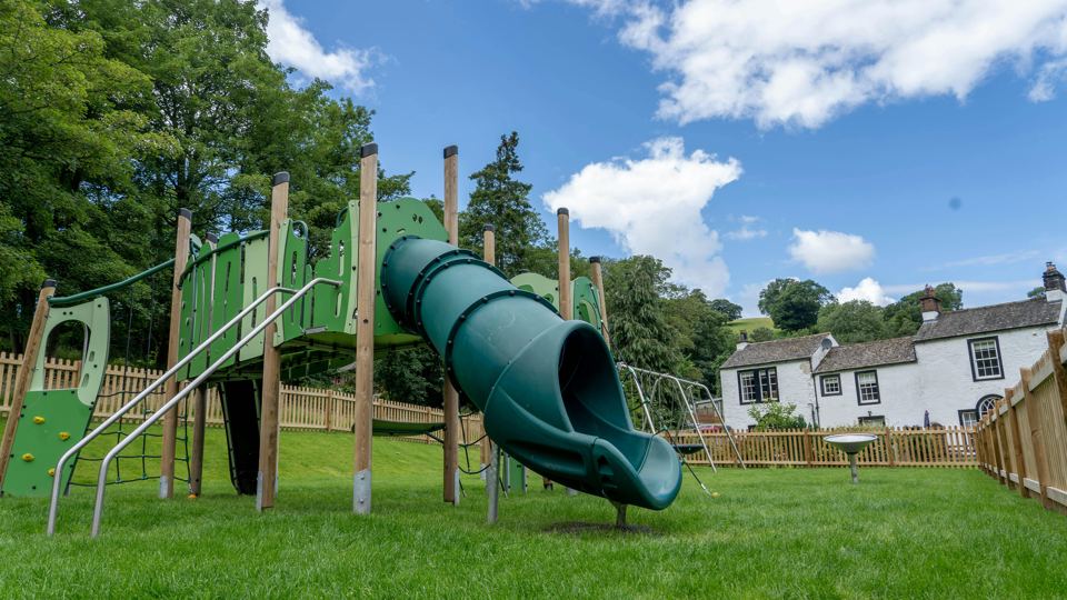 Playground with slide and climbing frame