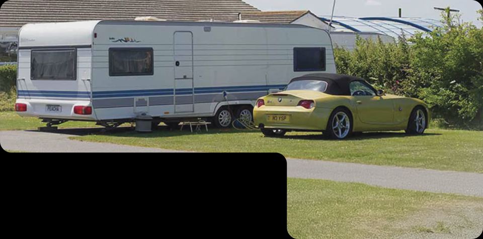 Touring caravan on grass