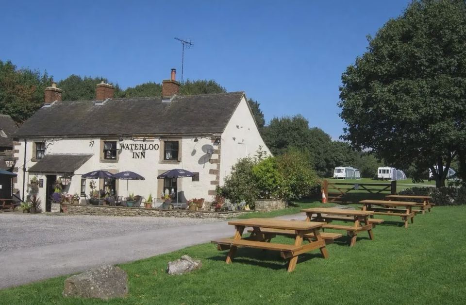 The Waterloo Inn and grass field