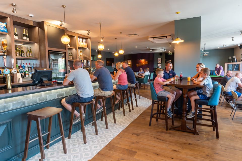 Bar with stools and pendant lights