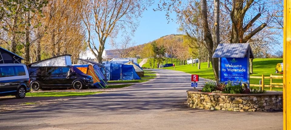 Tents and vans on the entrance road