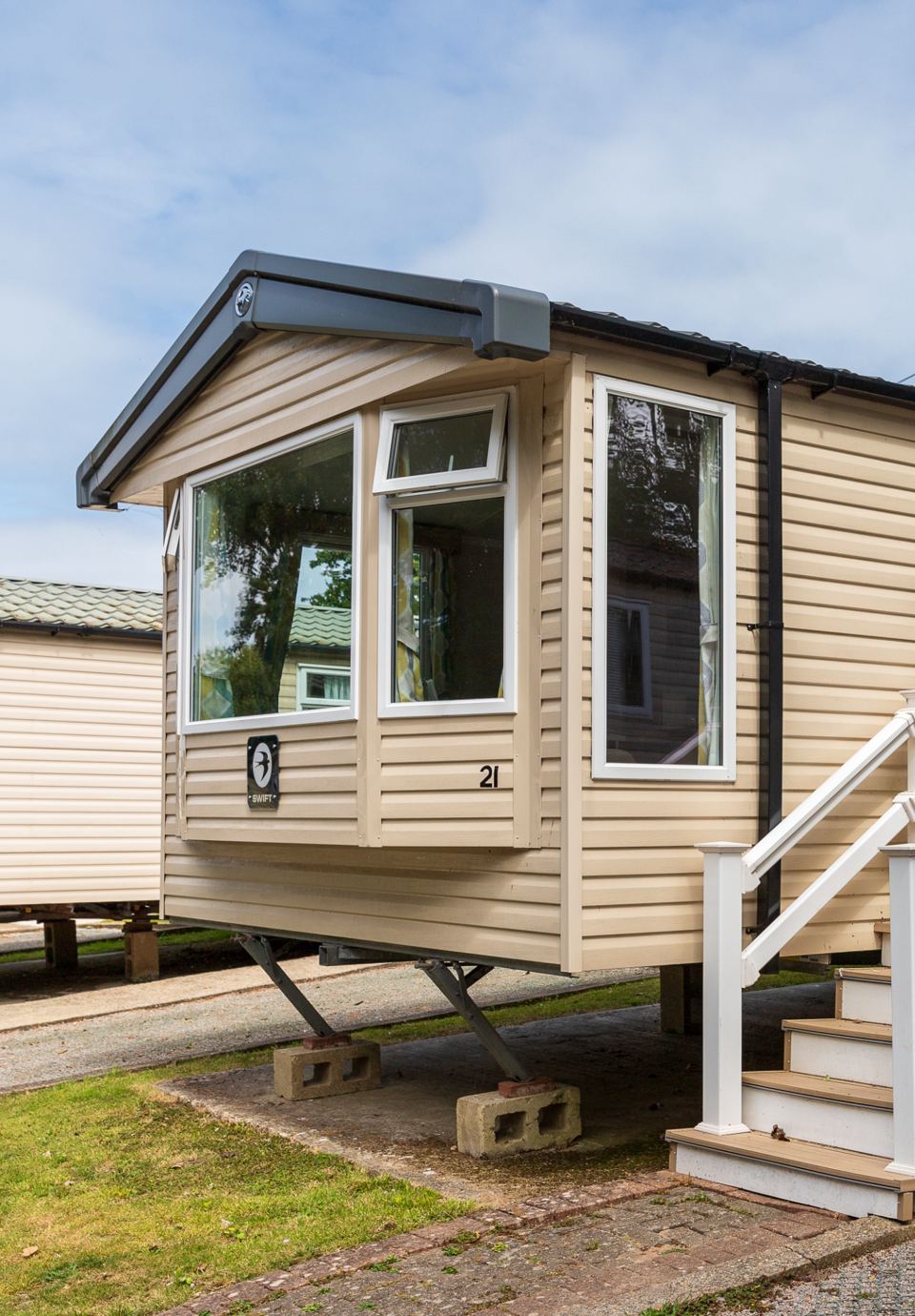 Static caravan with steps