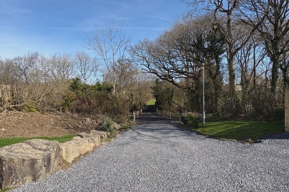 Gravel track through the trees