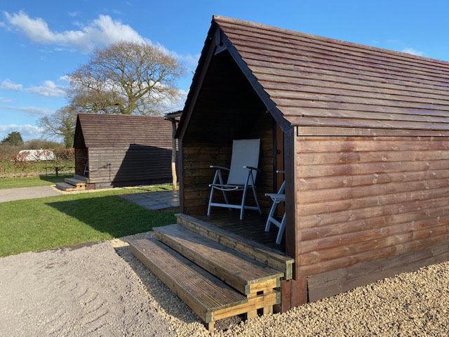 Wooden cabin on the gravel
