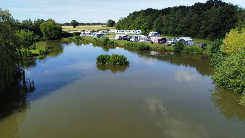 Pitches along the lake from above