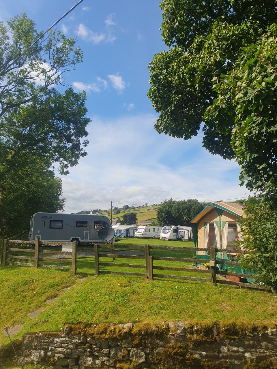 Caravan pitches behind a fence