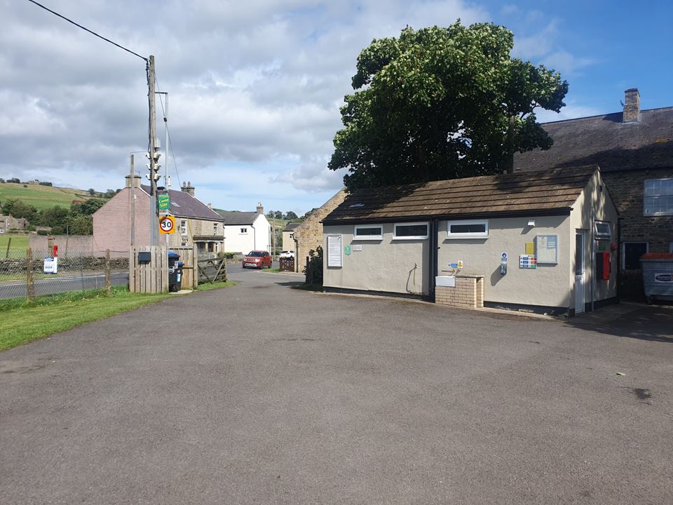 Toilet block and car park
