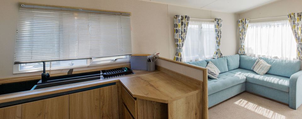 Holiday caravan lounge and kitchen