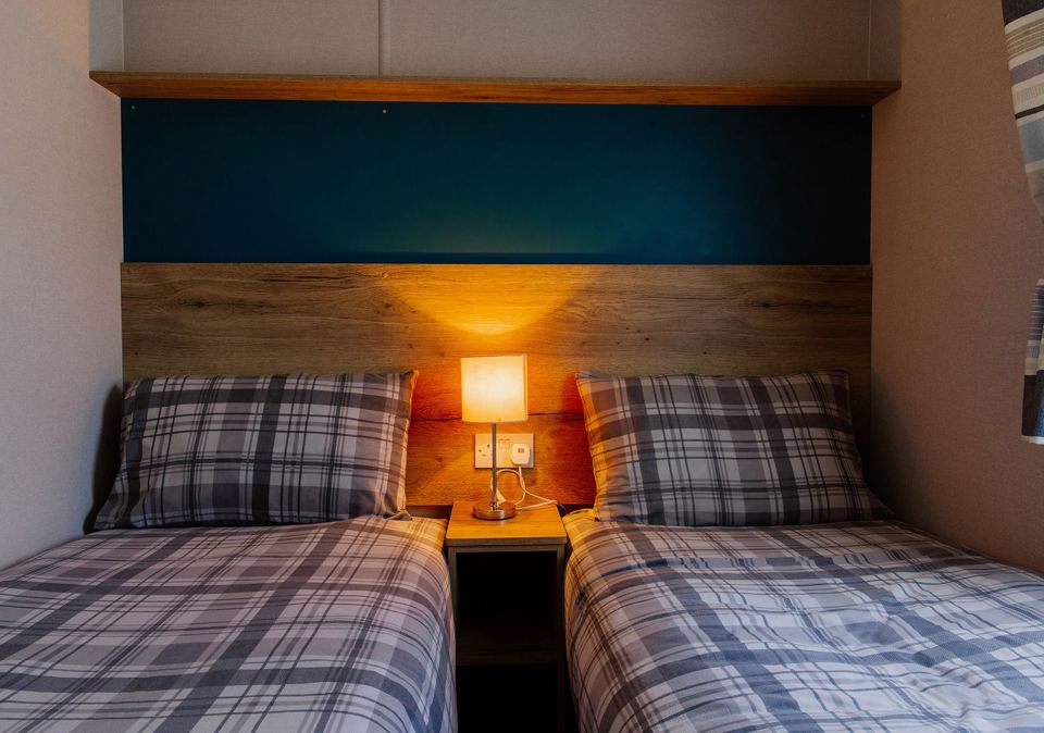 Twin bedroom in a holiday caravan