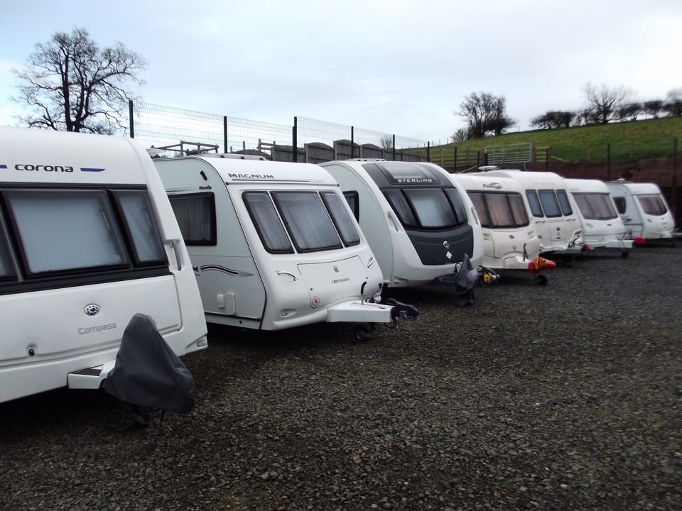 Row of caravans on gravel