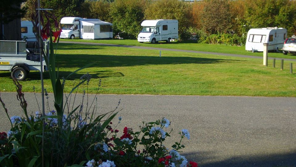 Grass pitches and tarmac road
