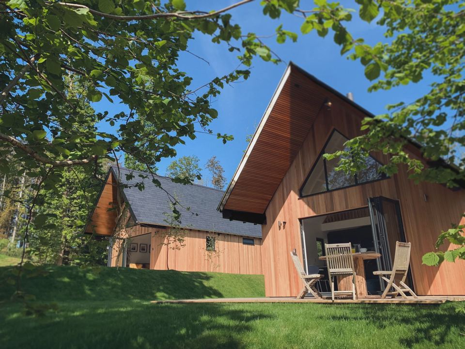 Timber lodge with patio doors open