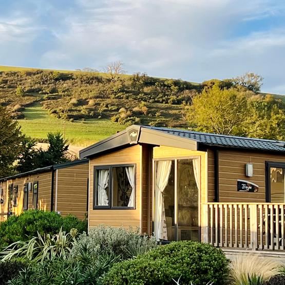 Lodge at dusk on the grass