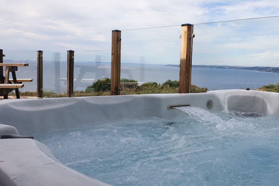 Hot tub overlooking the sea