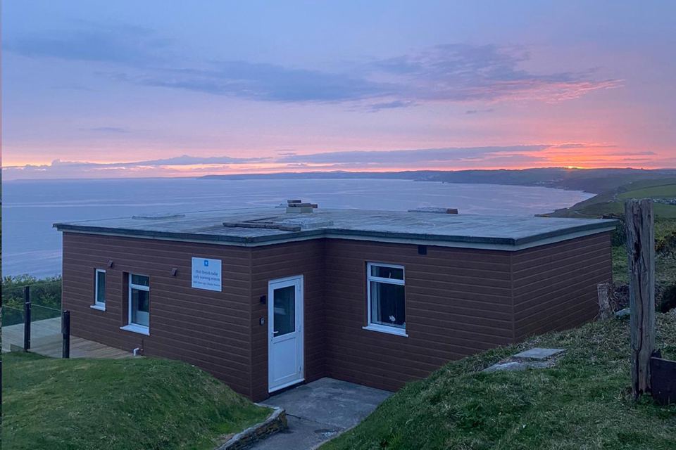 Cabin at sunset over the bay