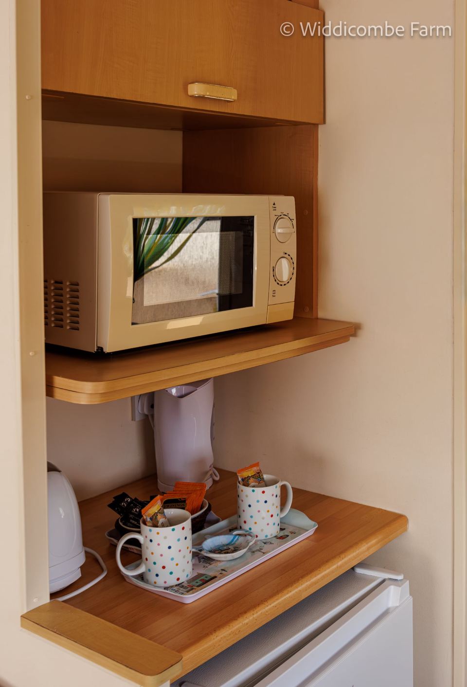 Microwave and kettle in the caravan