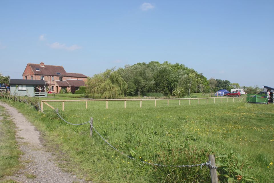 Camp field and farmhouse