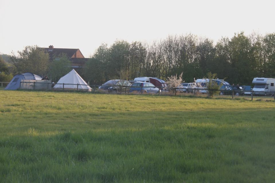Row of tents and vans
