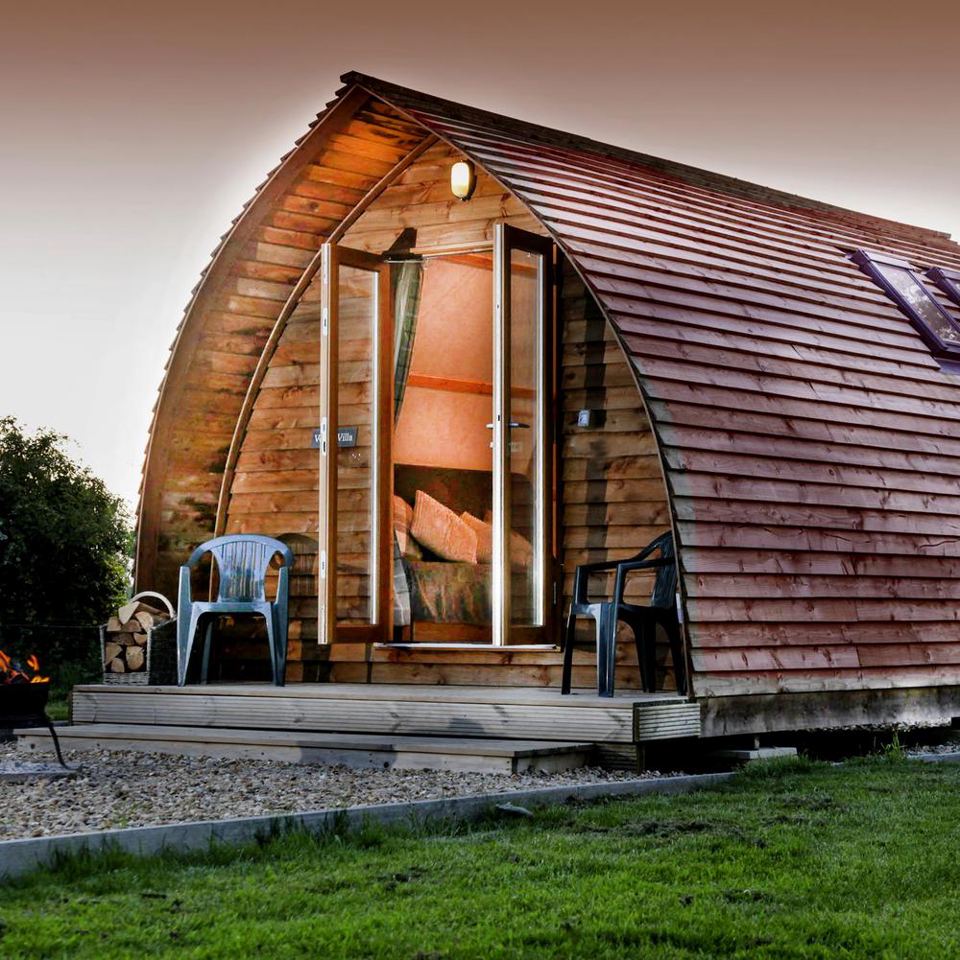 Cabin with chairs outside