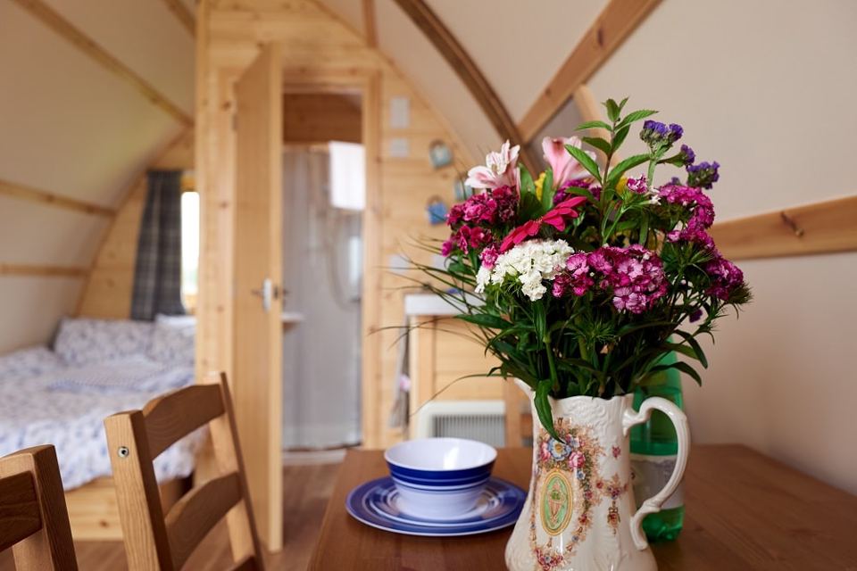 Pod interior with flowers on the table